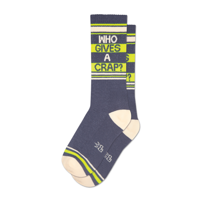 A pair of grey crew socks with neon yellow stripes and the phrase
