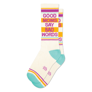 Pair of cream crew socks with teal, orange, and purple stripes and the phrase 'Good Moms Say Bad Words' in pink.