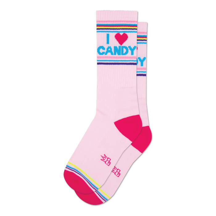 Pair of pink crew socks with a bright pink, blue, and purple stripe at the top and bottom. The socks feature the text 'I Heart Candy' in a playful font. }}