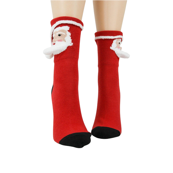 Close-up of Santa 3D socks on a model's feet, showing the design detail.