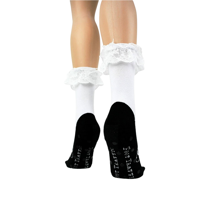 A pair of white socks with black soles and a black ballet flat design on the top of the foot. The socks are made of cotton and have a lace trim at the top.