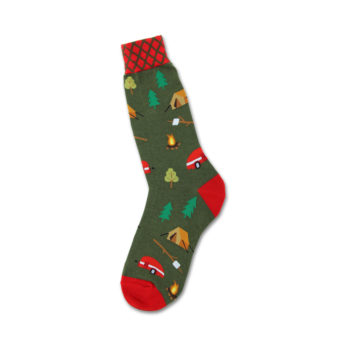 mens green crew socks feature a pattern of red tents, evergreen trees, campfires, and white marshmallows roasting on sticks.   }}