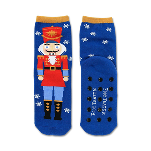   blue crew socks with nutcrackers, snowflakes, and stars pattern. non-skid sole. christmas theme.  
