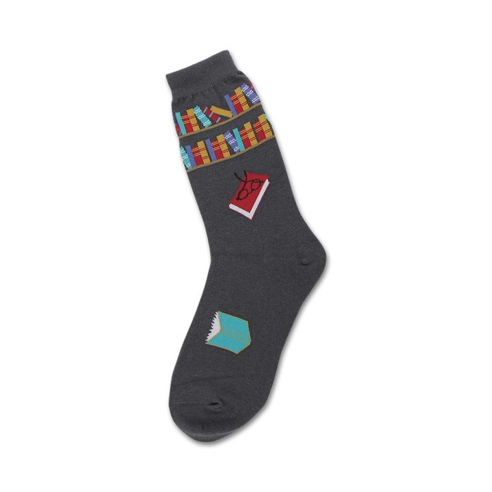 Close-up of gray crew socks with the same book-themed design as the cream socks.