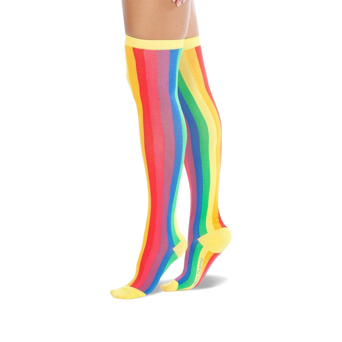 yellow and rainbow striped pride themed knee high novelty socks for women.   }}