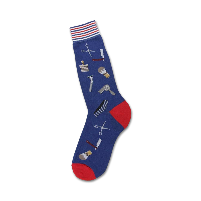 Blue crew socks with a red cuff, featuring illustrated barber tools like scissors, razors, combs and shaving brushes. }}