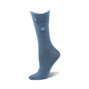 Close-up of a blue Shark Bite 3D sock on a mannequin foot.