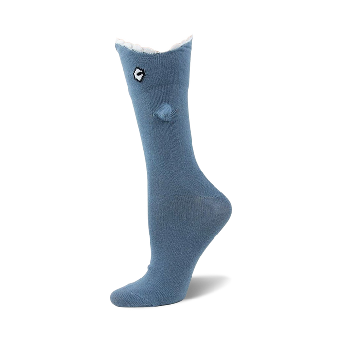 Close-up of a blue Shark Bite 3D sock on a mannequin foot.