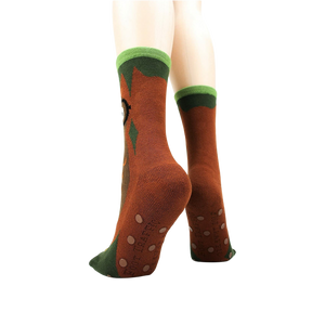 Back view of socks on a model showing the non-skid grip.