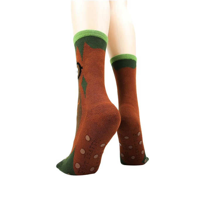 Back view of socks on a model showing the non-skid grip.