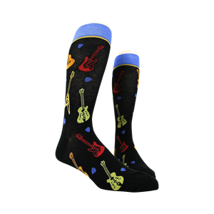 Pair of black crew socks with guitar designs shown on a mannequin.