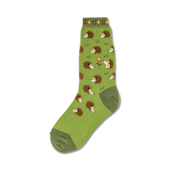 Green crew socks with a pattern of brown hedgehogs and a single orange flower. The socks have a green cuff. }}