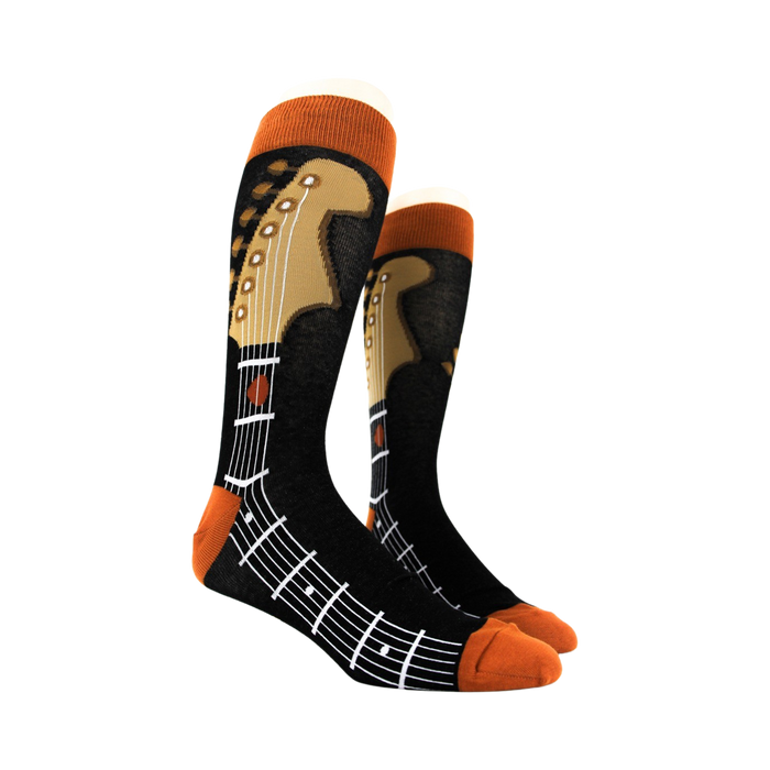 Pair of Guitar Neck socks on a mannequin, showcasing the full design.