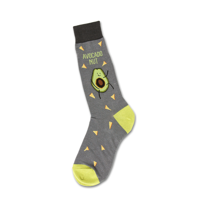 Crew socks in gray with a lime green cuff.  The design includes a cartoon avocado and yellow tortilla chip shapes. }}
