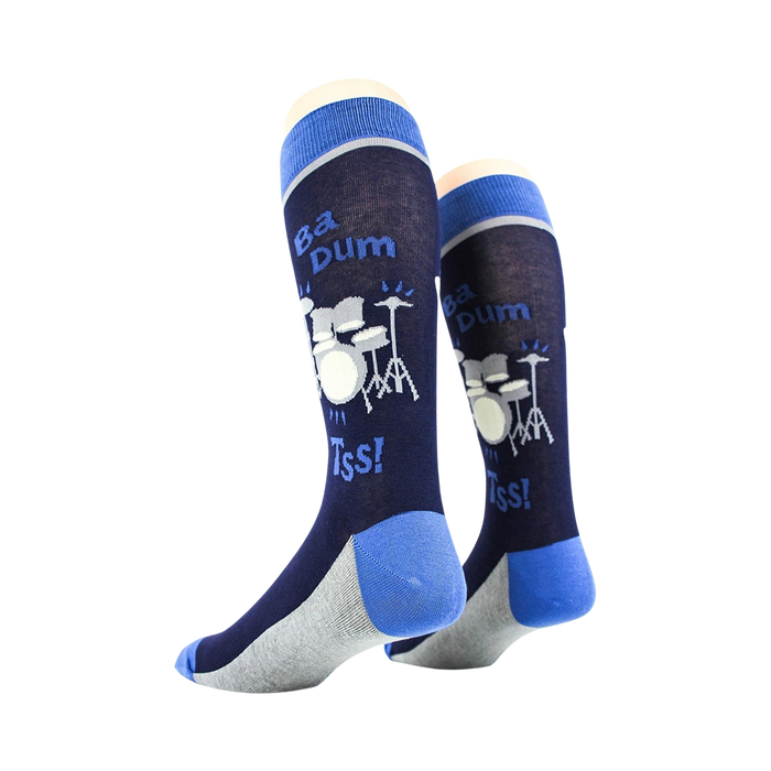 Rear view of two 'Drum Set' socks on a mannequin, showcasing the back of the sock design.