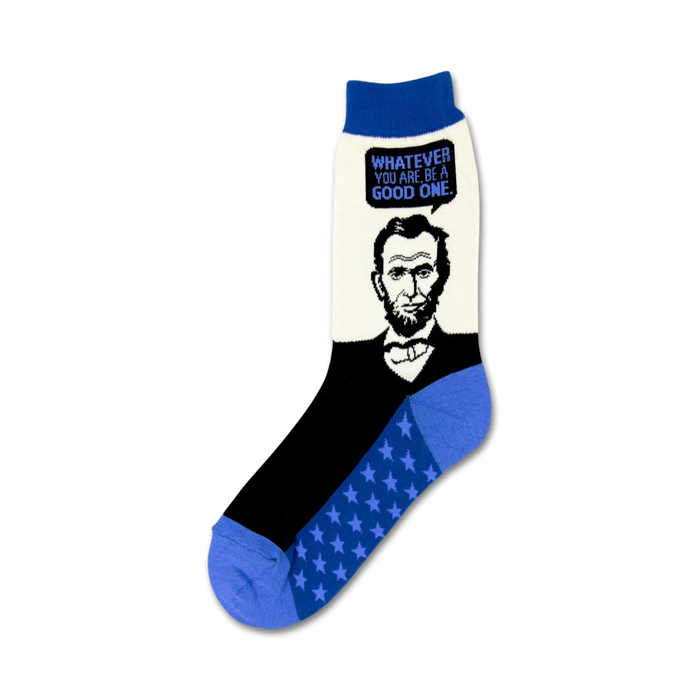 women's abe lincoln crew socks feature black socks with white toe, heel and top with blue star pattern on leg and abraham lincoln's face on front and quote, 