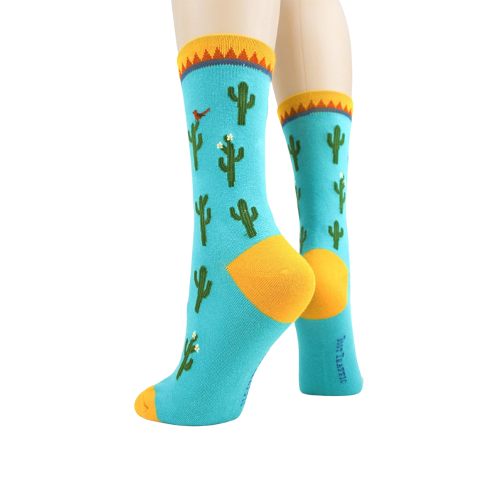 Back view of the Cactus socks on a mannequin leg, showcasing the heel and cuff.