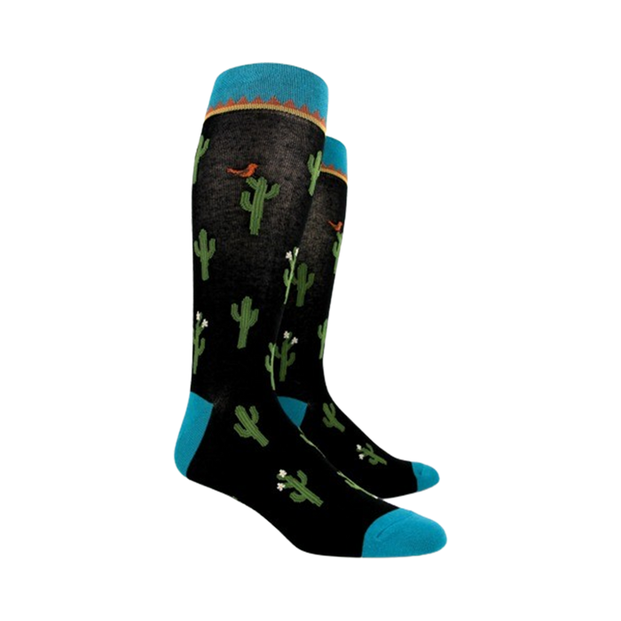 Pair of black crew socks with cactus print, teal blue cuffs, shown from the side.
