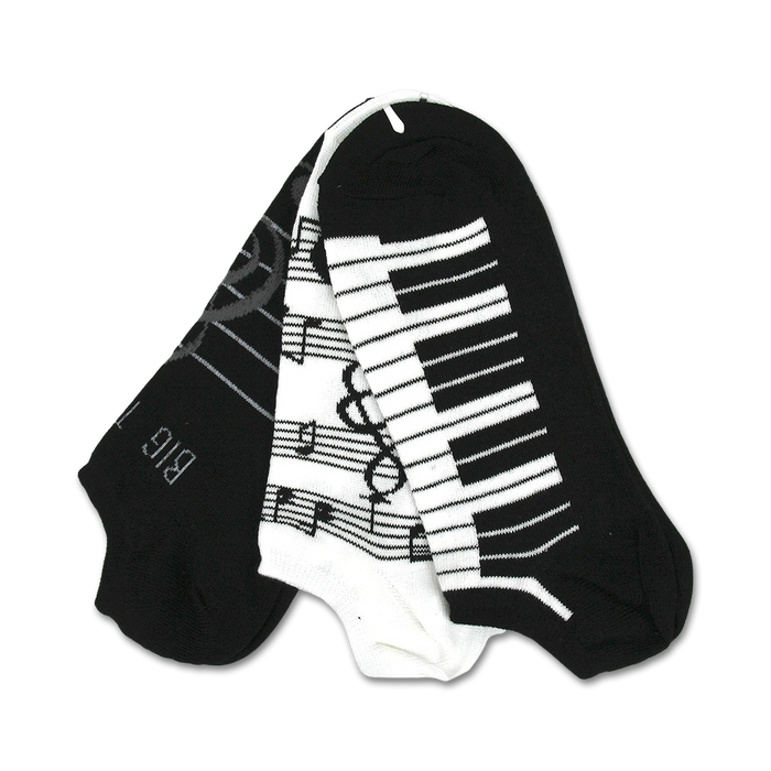 Three ankle socks: one black with musical notes, one white with piano keys, and one black with piano keys. All feature black and white designs. }}