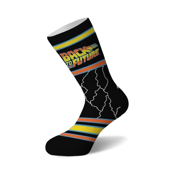 Crew socks in black with the 'Back to the Future' logo in orange and yellow, and white lightning bolt accents. }}