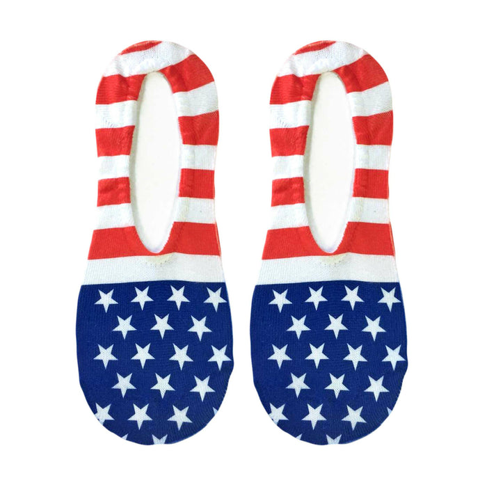 A pair of no-show socks with an American flag pattern. The socks are red and white striped with blue stars on a white background. The words 