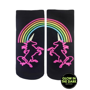 Pair of black ankle socks with a neon pink unicorn silhouette under a rainbow.  Glow-in-the-dark design.