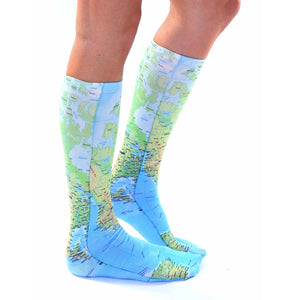 Lifestyle shot of a person wearing the Map socks, showcasing the fit and style.