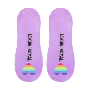 A pair of purple socks with the words 
