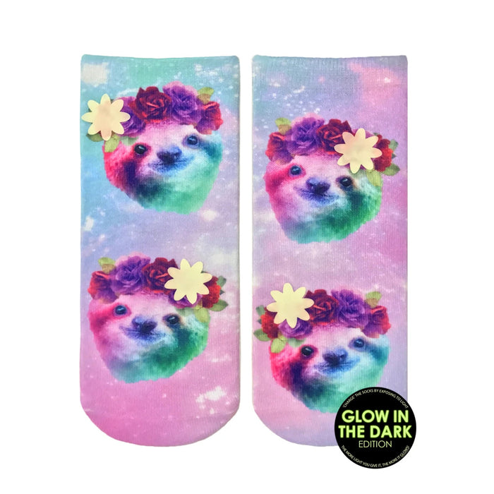 Crew socks with a pastel galaxy print. Rainbow sloths wear flower crowns. Glow-in-the-dark feature. }}