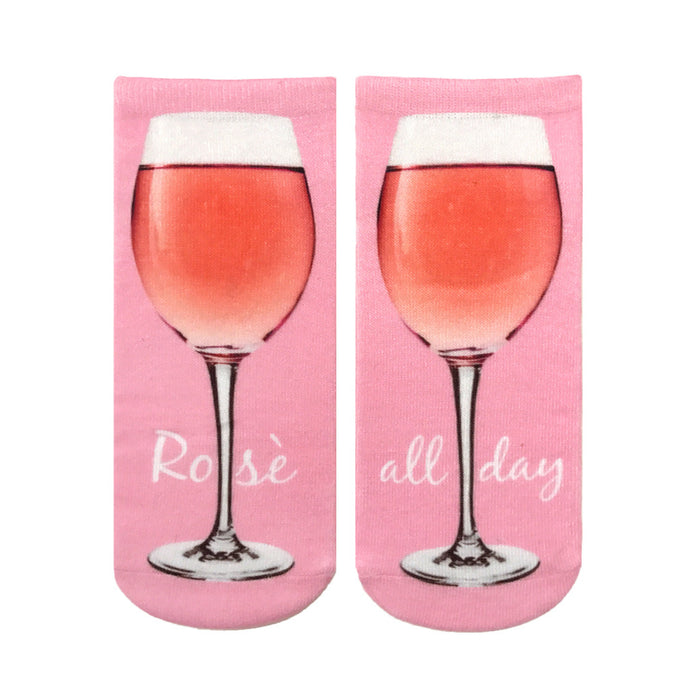 Pair of pink ankle socks with a graphic of a glass of rosé wine and the text 'Rosé all day'. }}