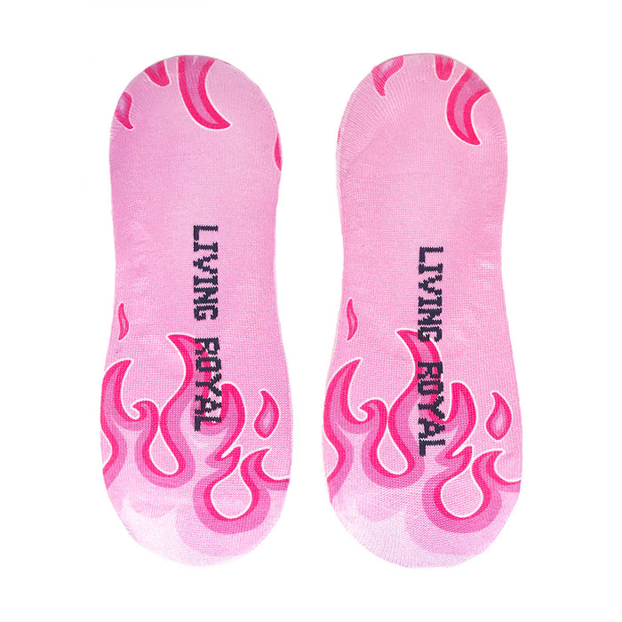 A pair of pink no-show socks with a flame design in a darker shade of pink. The flame design is outlined in black. The socks have the words 