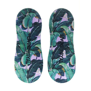 A pair of green and purple leaf print socks with the words 