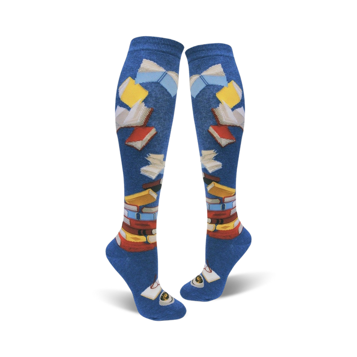 Pair of blue and navy knee-high socks with colorful book and page designs. Fun and literary!
