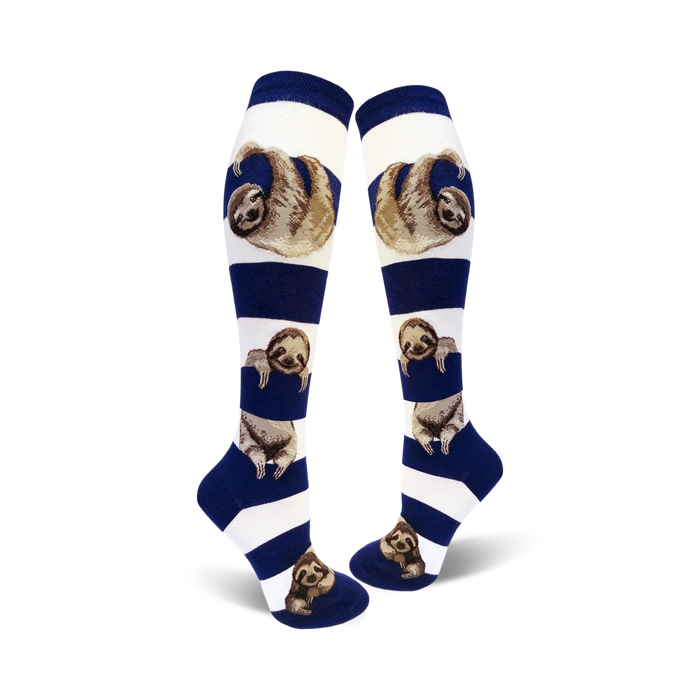 Lifestyle shot showing the model wearing the white and navy blue sloth stripe knee-high socks.
