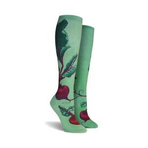 Lifestyle shot of a woman's legs wearing the beet socks outdoors.