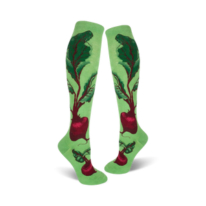 Pair of women's knee-high socks. Light green background with a whimsical beet and leaf design in deep reds and greens.