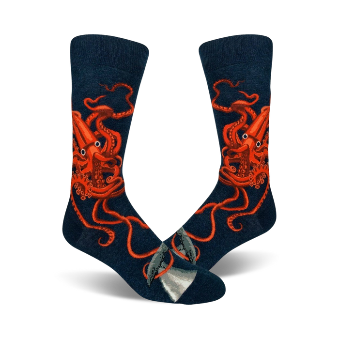dark blue crew socks with orange octopus attacking sperm whale pattern.   }}