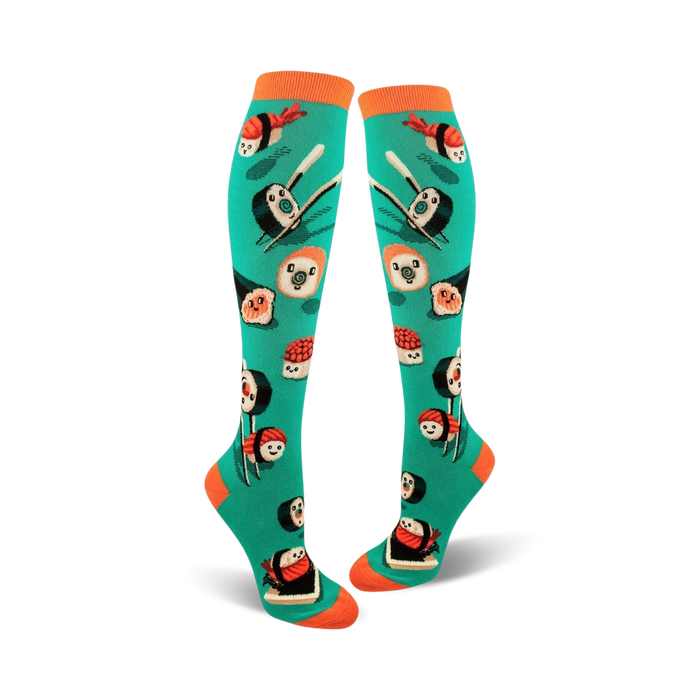 Pair of teal knee-high socks with a fun sushi print. The socks feature various types of sushi, including maki and nigiri, with orange accents. }}