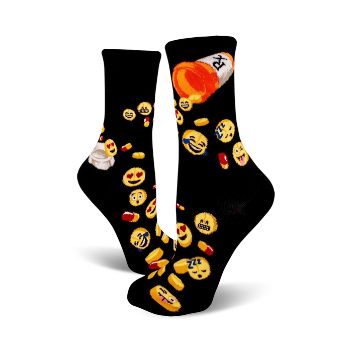 Black crew socks covered in yellow emojis and colorful pills. A fun and quirky design. }}