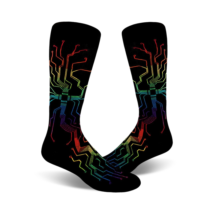 Pair of black crew socks with a rainbow-colored circuit board design. The vibrant design features rainbow colored lines and chips on a black background. }}