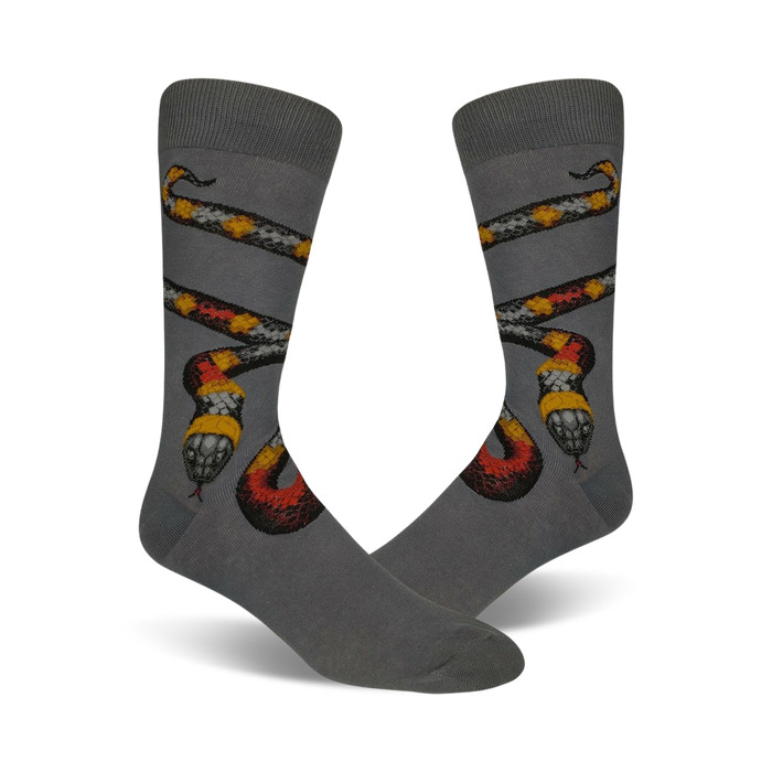 Pair of gray crew socks with a detailed coral snake design in red, yellow, black and white. }}