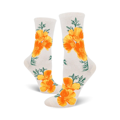 A pair of off-white crew socks featuring a repeating pattern of bright orange California poppies and green foliage.