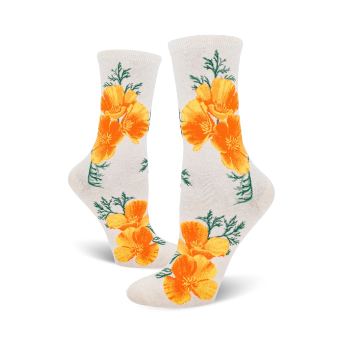 white crew socks with orange california poppy pattern on a green stem and leaf background.   }}