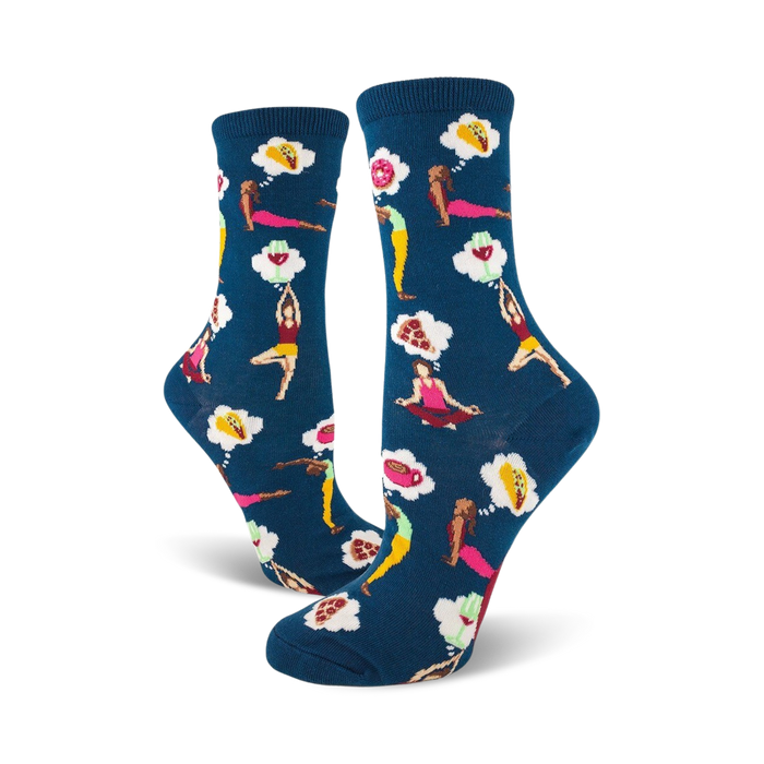 A pair of women's crew socks in teal blue. The socks are adorned with a pattern of women doing yoga poses and dreaming of food like pizza and tacos. }}