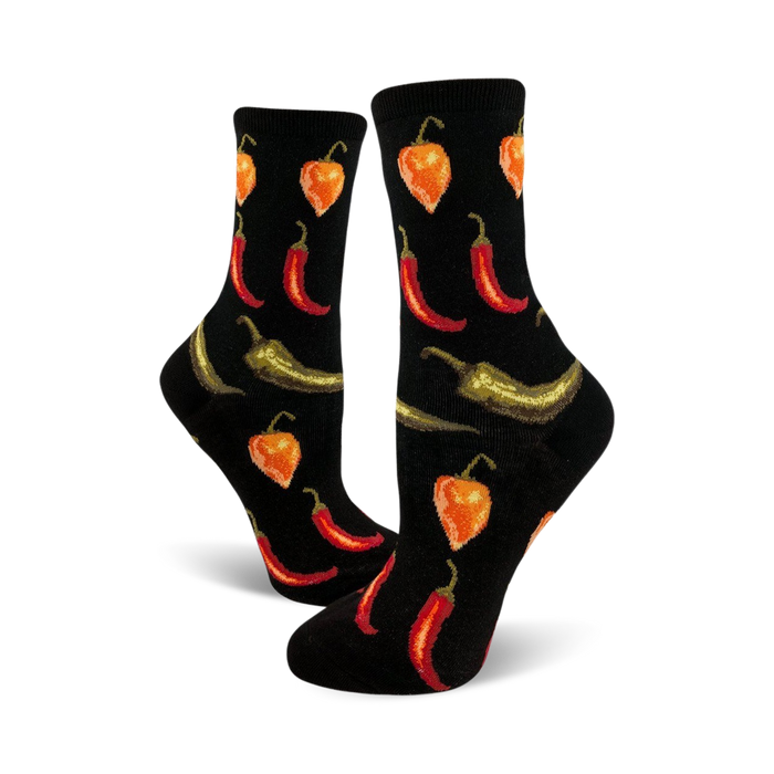 black crew socks with red, orange, green, and yellow chili pepper pattern. women's size, food & drink theme.   }}