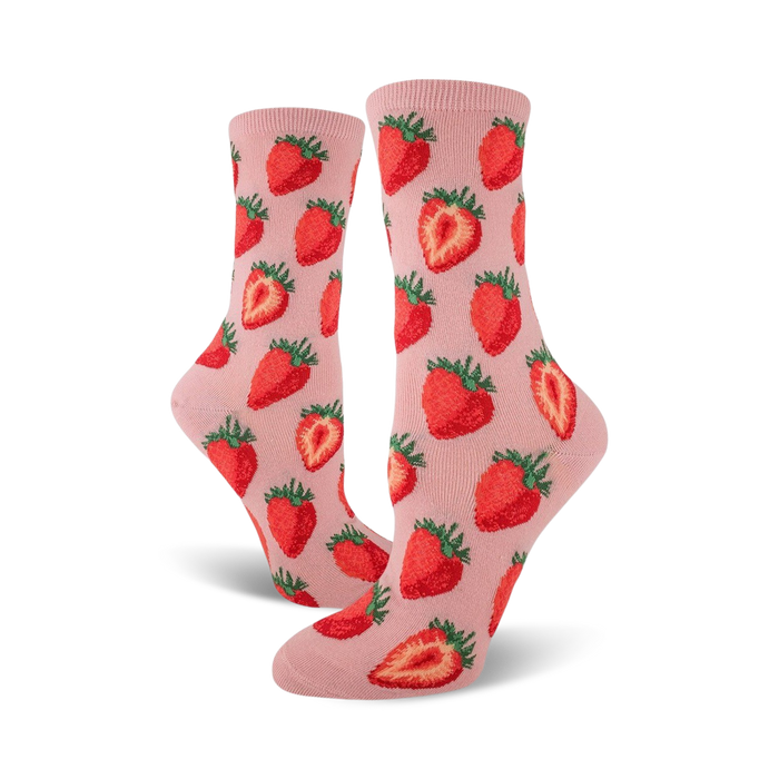 womens crew length novelty socks in bright pink with a colorful strawberry pattern throughout. 