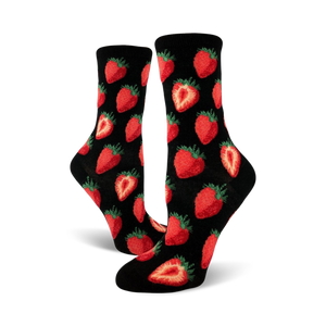 Close-up view of black crew socks with a red strawberry pattern. The socks are folded and displayed against a white background.
