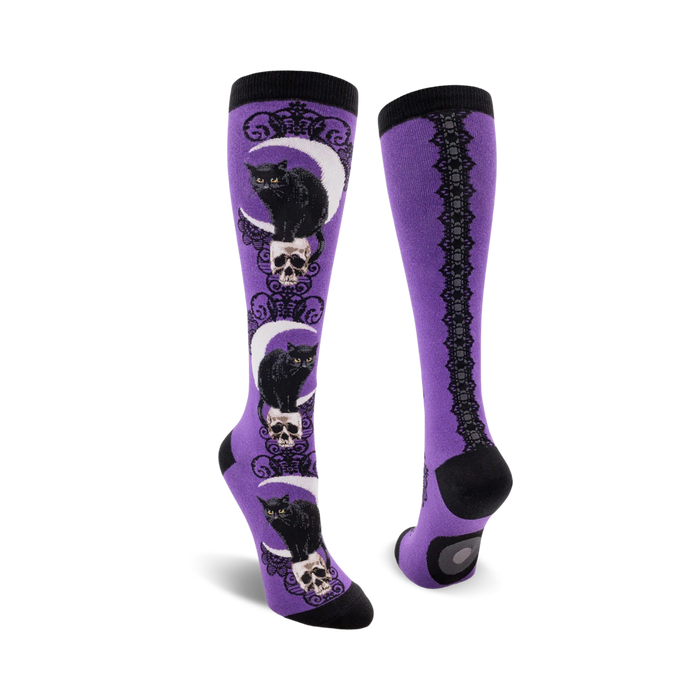 Lifestyle shot: Model wearing purple Black Cat Moon knee-high socks.