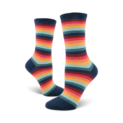 Pair of women's crew socks in a retro rainbow stripe pattern.  Colors include teal, orange, red, and dark blue.