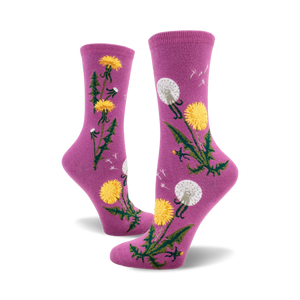 Lifestyle shot showing the mauve dandelion socks on a model's feet.